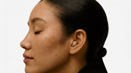 Woman in profile wearing a ViSound Air Skin Tones earbud close to her skin color