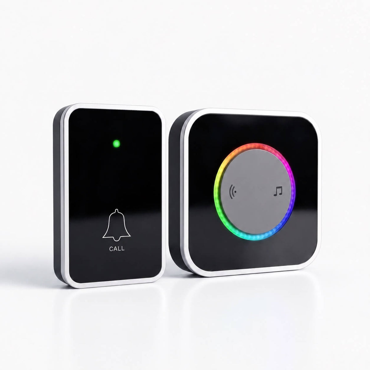 The Glow kit: one black doorbell button and one black plug-in chime with its ring of color lit, on a plain light background.